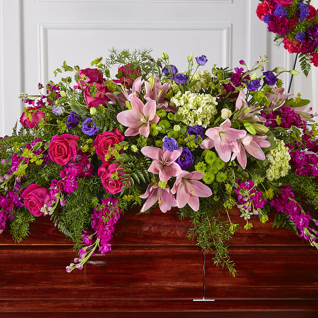 Radiant Tribute Casket Spray – LEMON TREE FLOWERS & THINGS, Columbiana OH